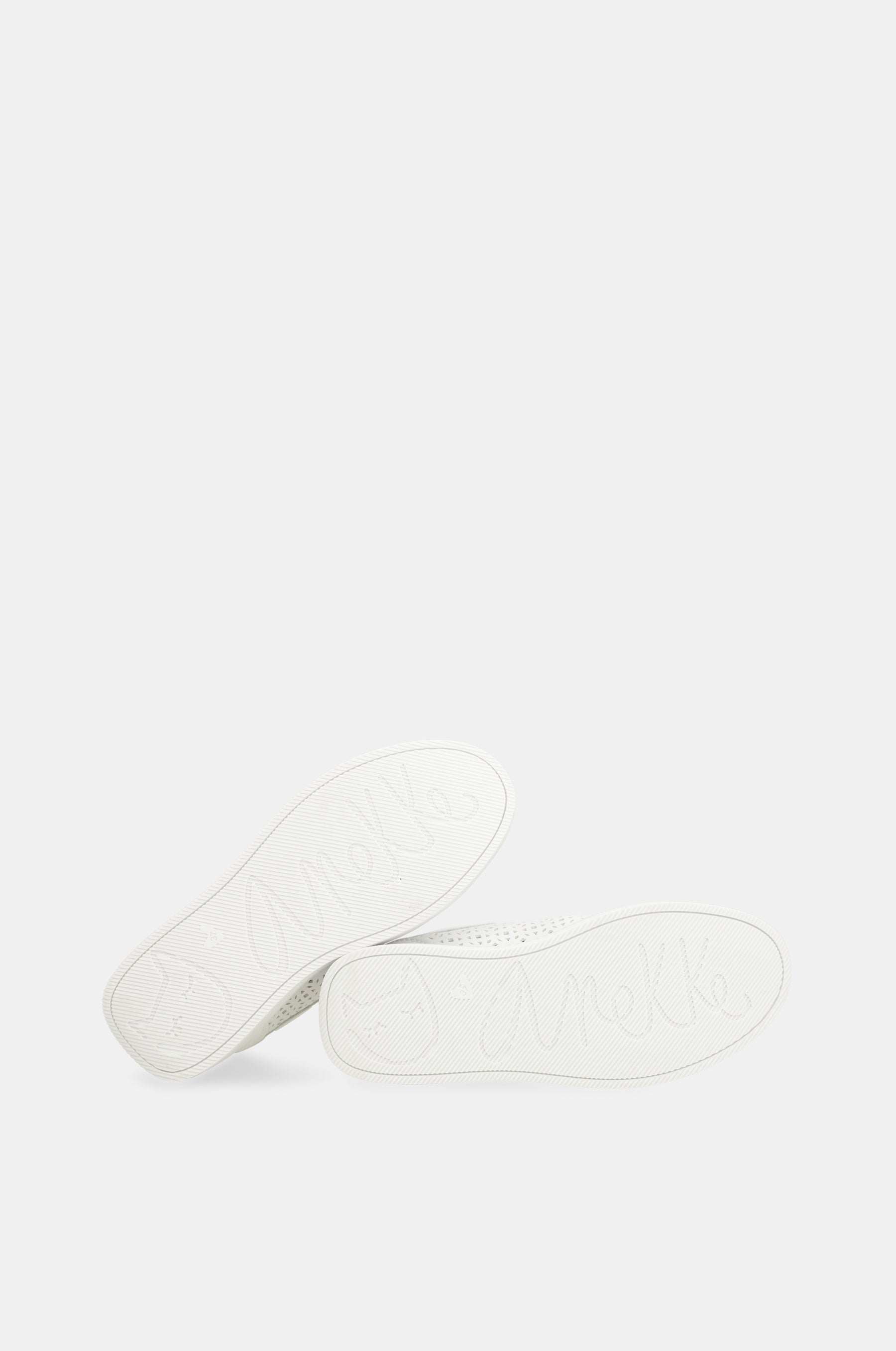 Sneakers a macchie bianche