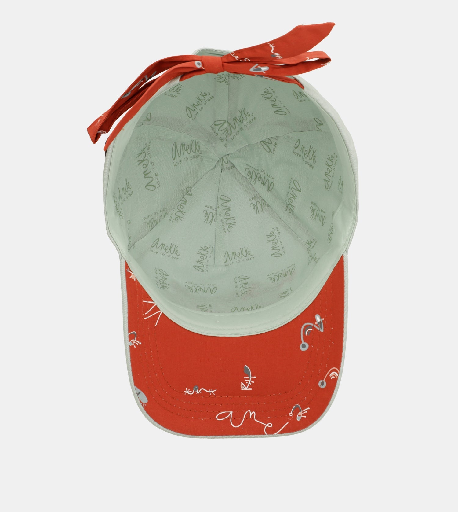 Berretto verde con fiocco rosso