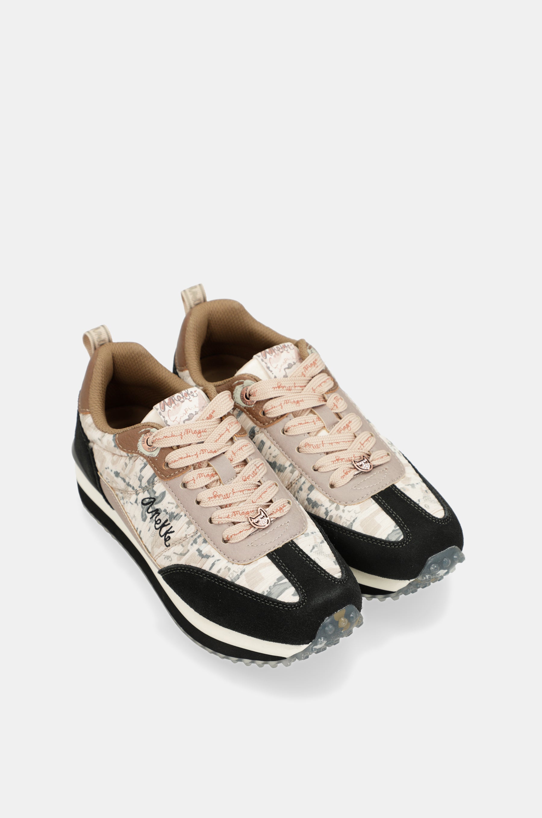 Scarpe sportive nero e oro suola multicolore