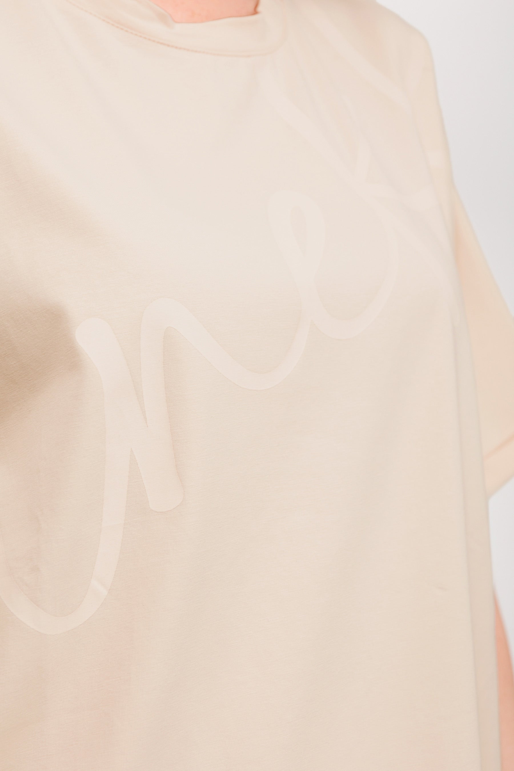 Maglietta a maniche corte beige con stampa