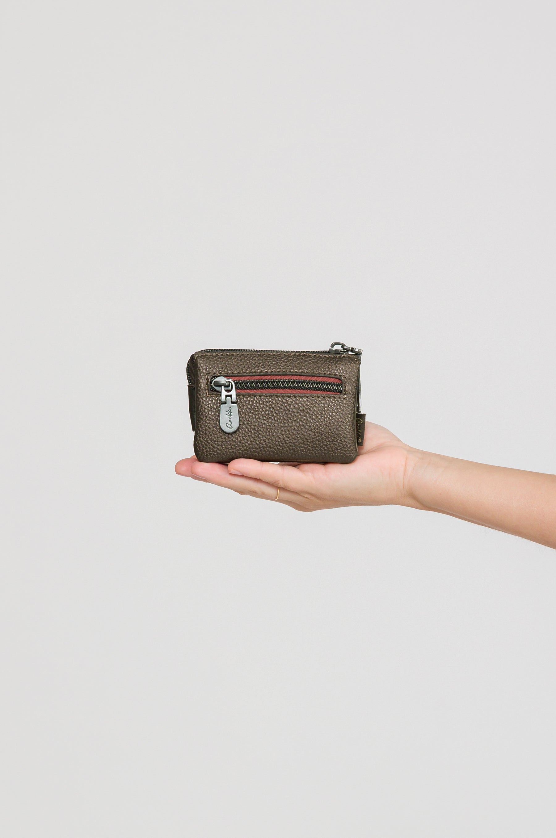 Portamonete a 3 scomparti Muse