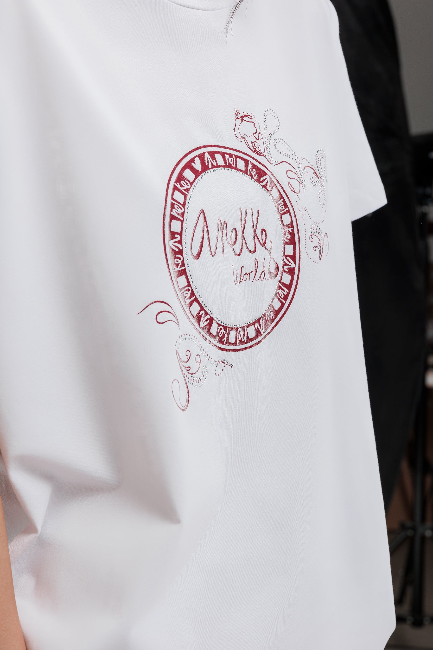 Maglietta manica corta bianca e particolare argento