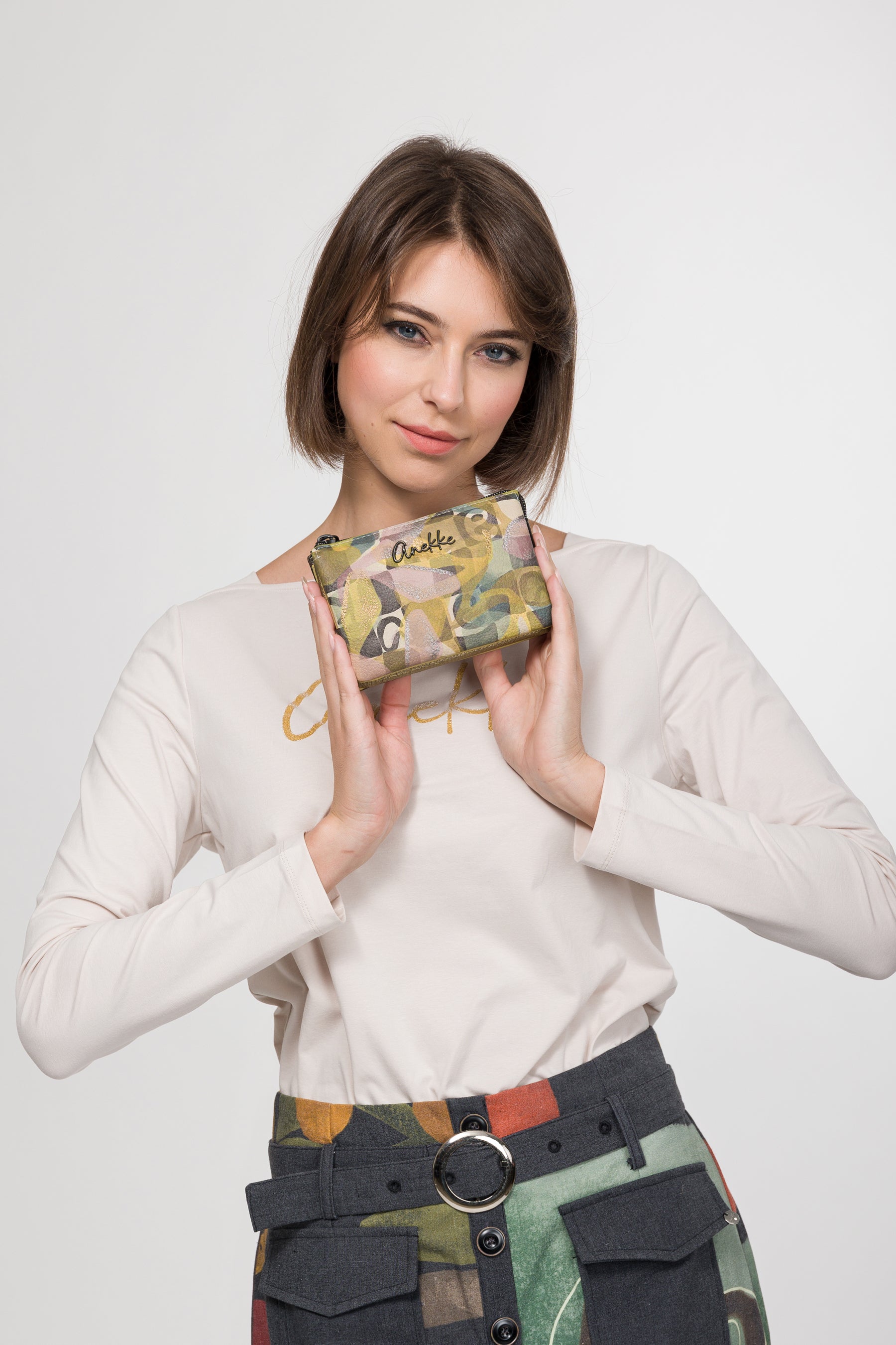 Portamonete a tre scomparti Bloom