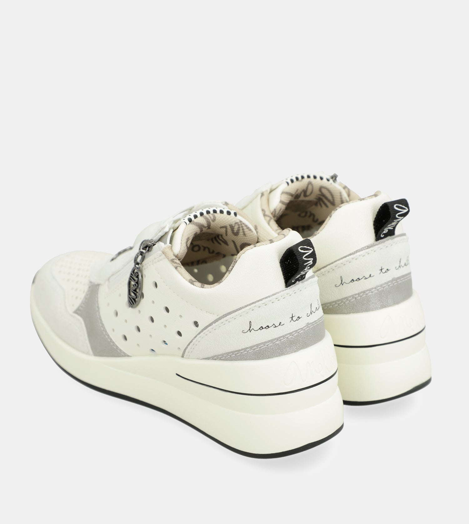Sneakers bianche a forma di cuneo con pois