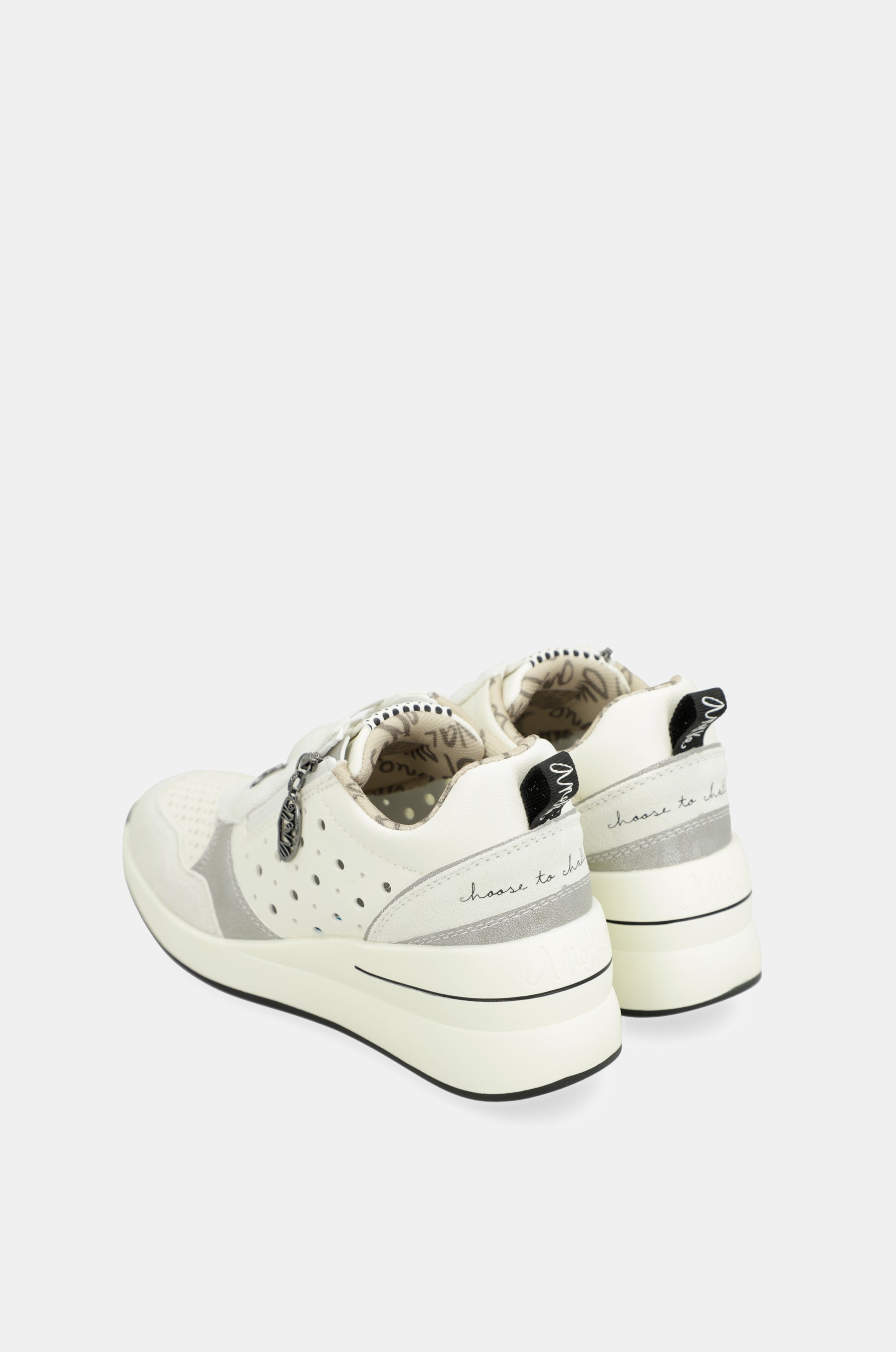Sneakers bianche a forma di cuneo con pois