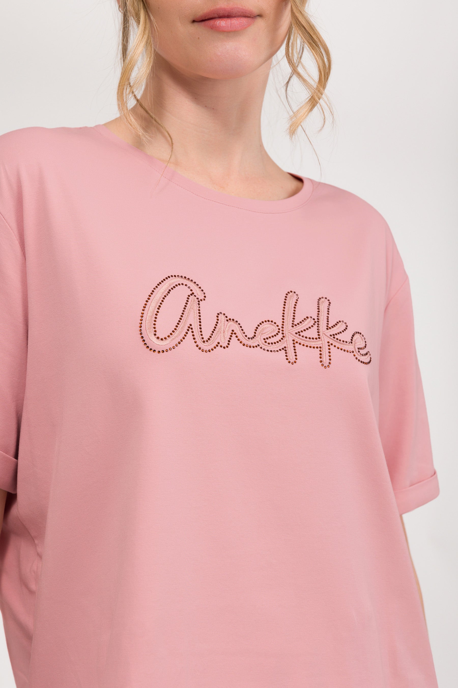 Maglietta a maniche corte rosa con logo
