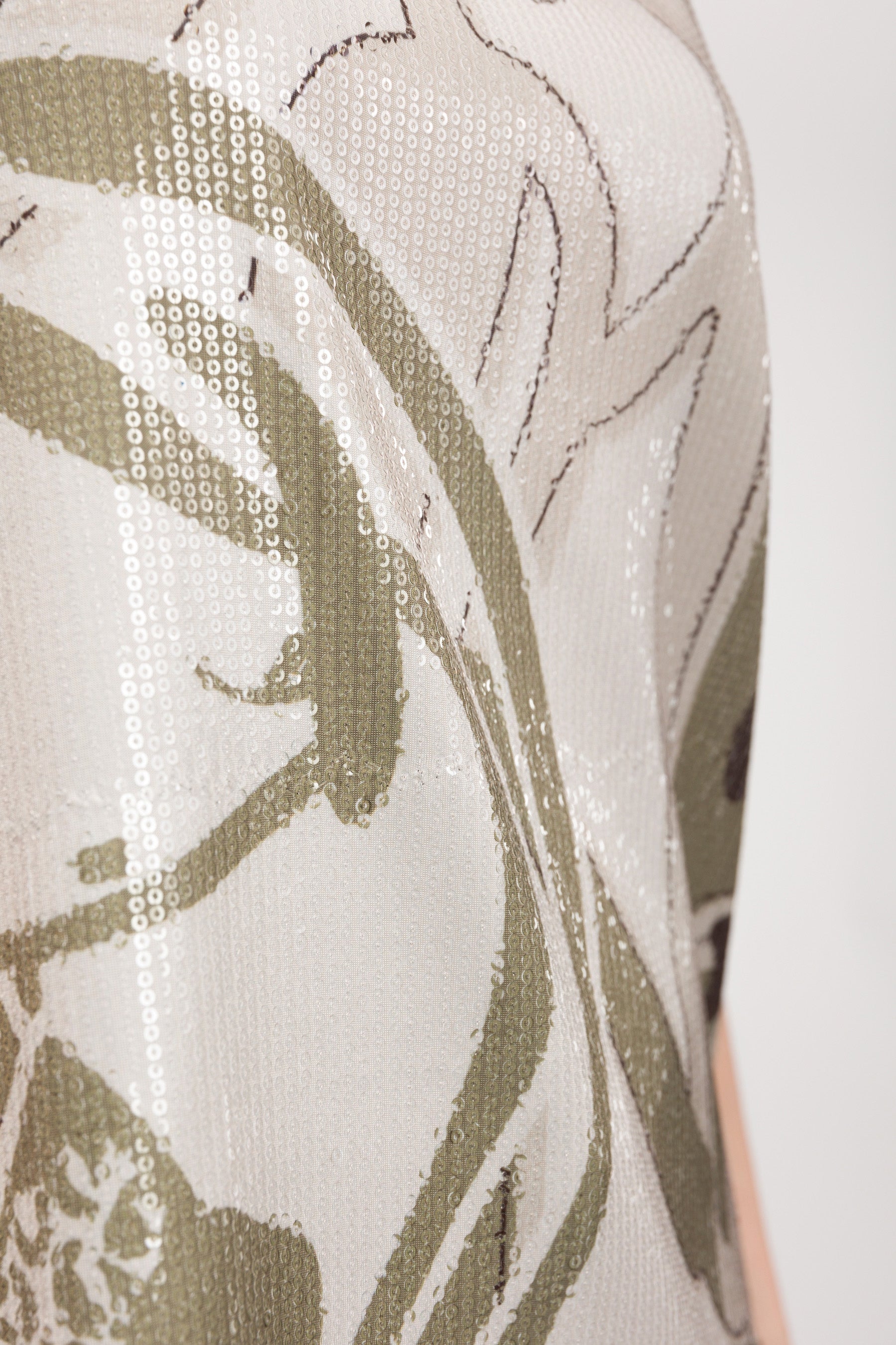 Maglietta beige con paillettes