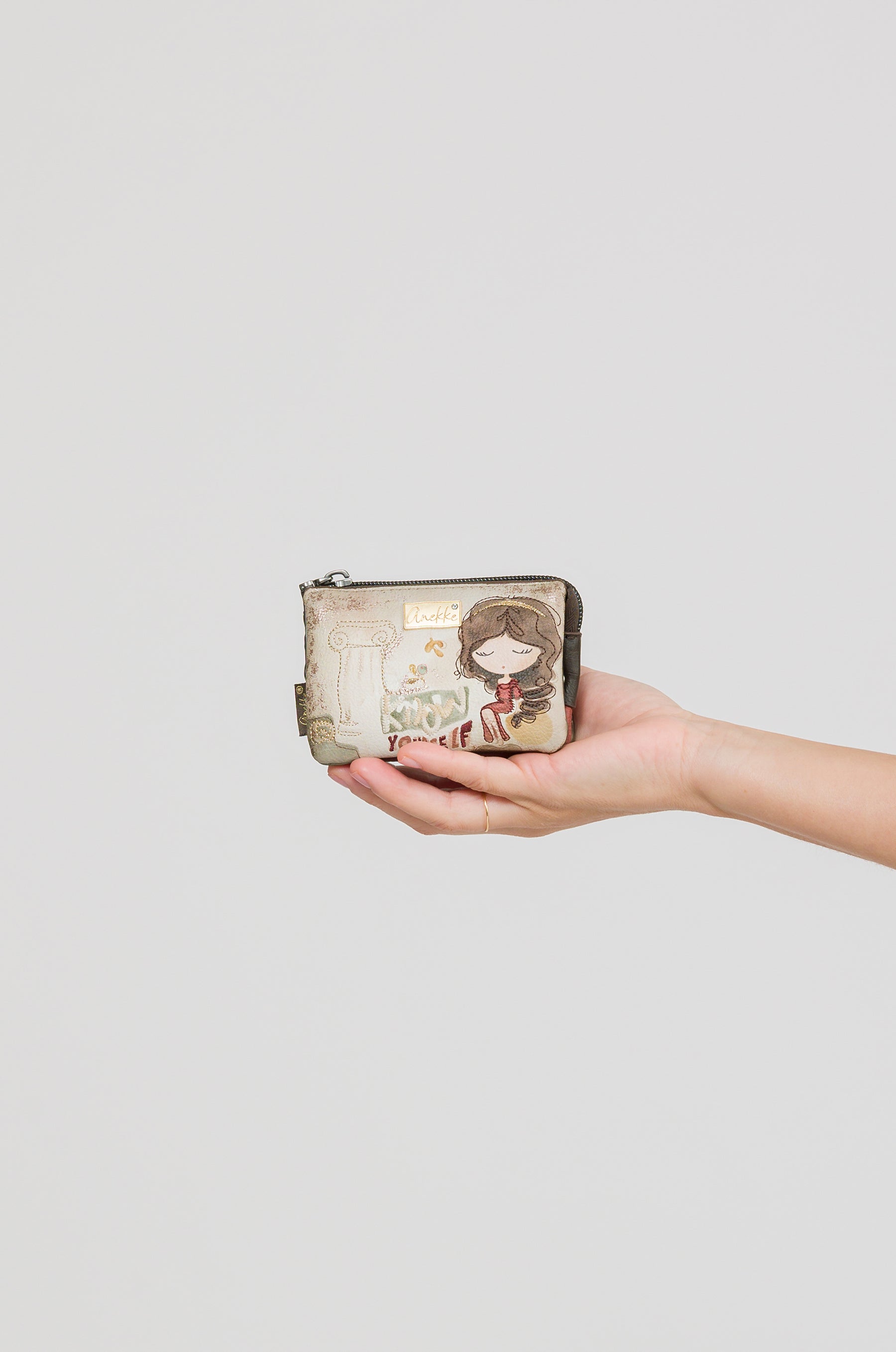 Portamonete a 3 scomparti Muse