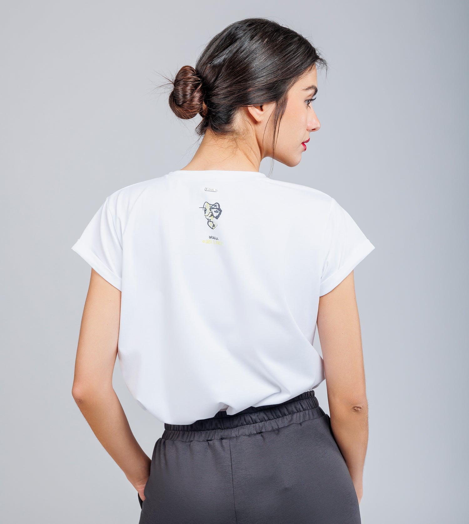 T-shirt bianca e dorata a maniche corte Anekke